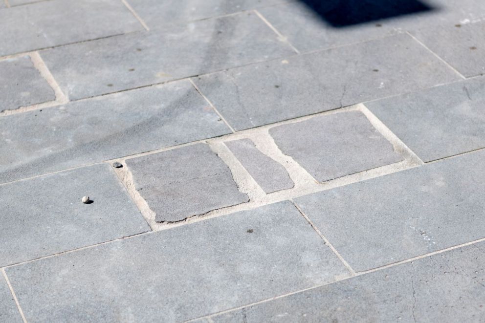 Salvaged bluestone pavers from the eastern station building have been repurposed within the new station forecourt