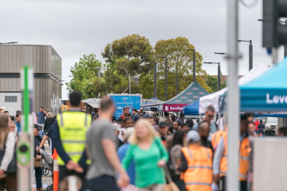 Crowds exploring the new station precinct