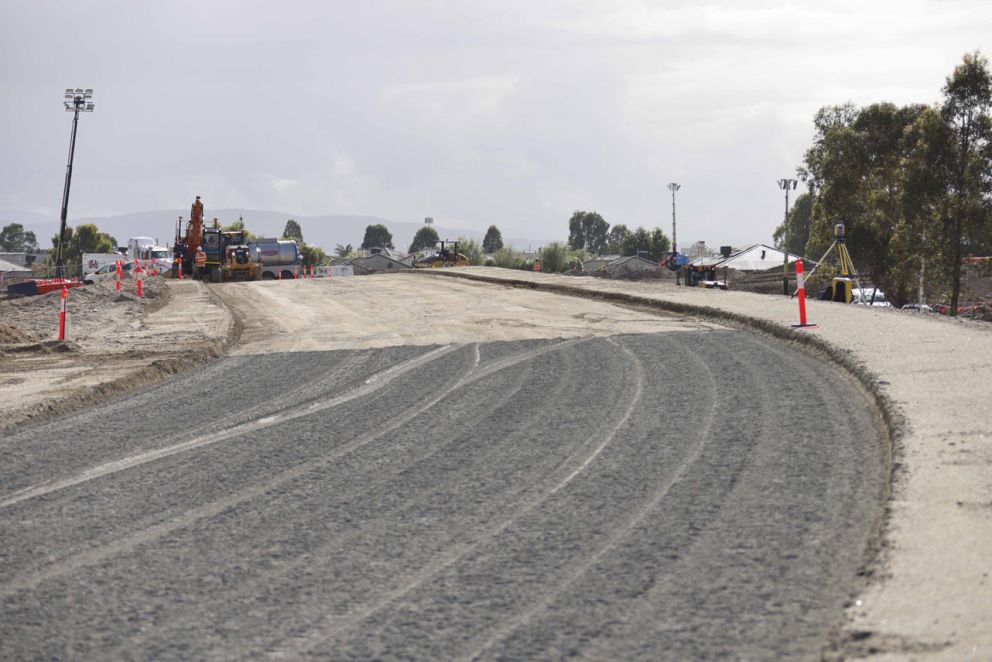 We’ve started laying crushed rock to build the widened freeway ramp.