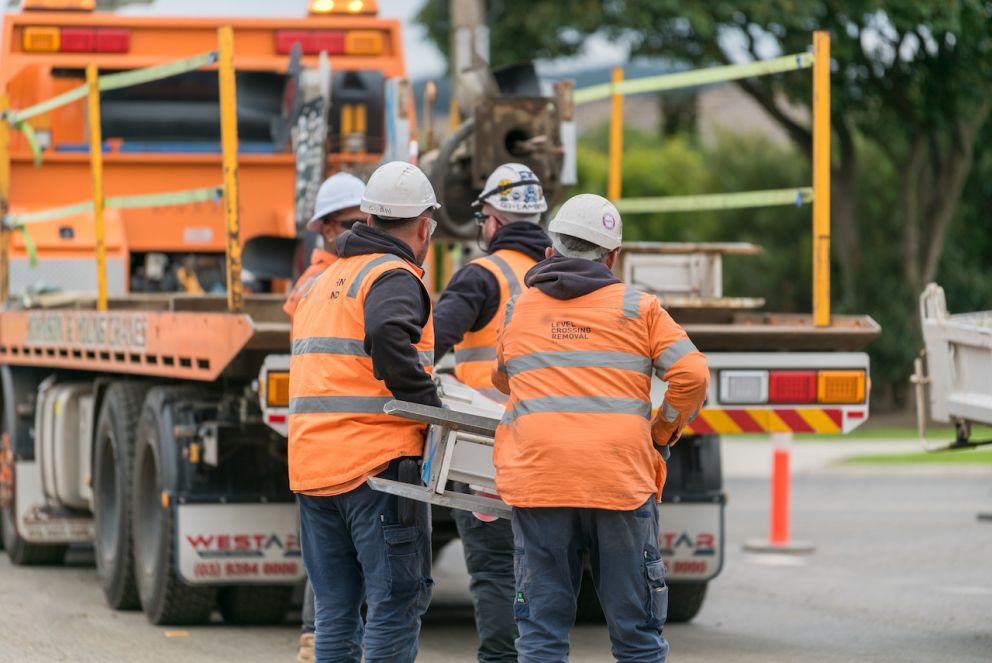 The McGregor Road boomgates being lifted into a truck