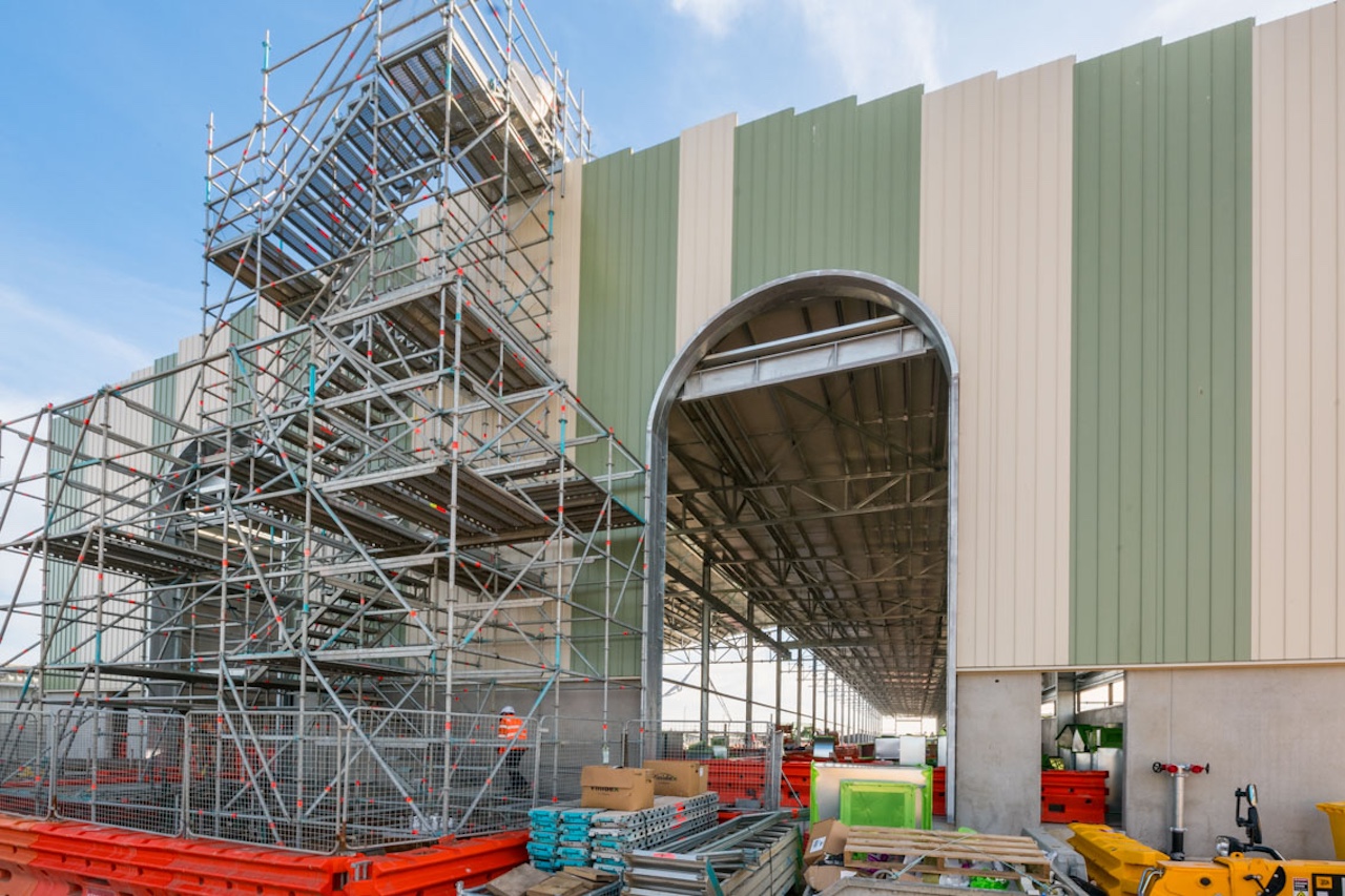 Image shows large scaffolding at construction site.