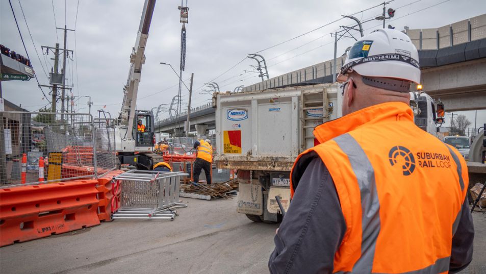 Constructyion worker watching over the works occurring in Clayton