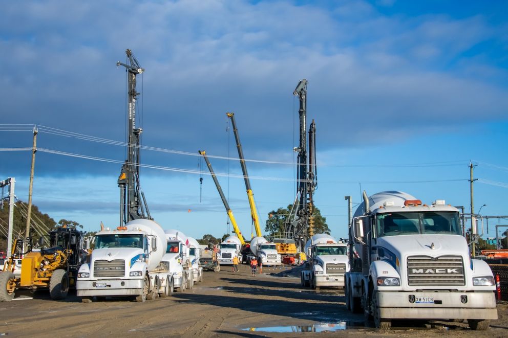Piling cages and concrete trucks on site