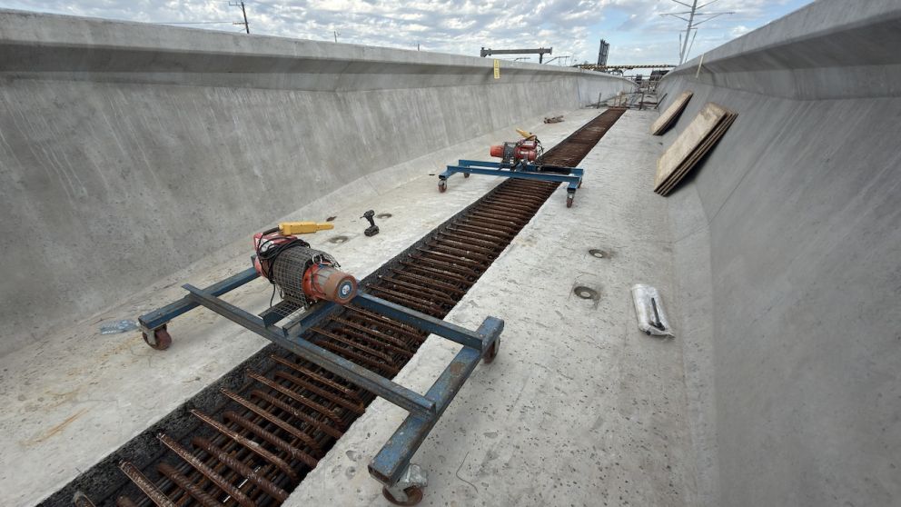 Formwork in place prior to concrete being poured into the gap between L-beams