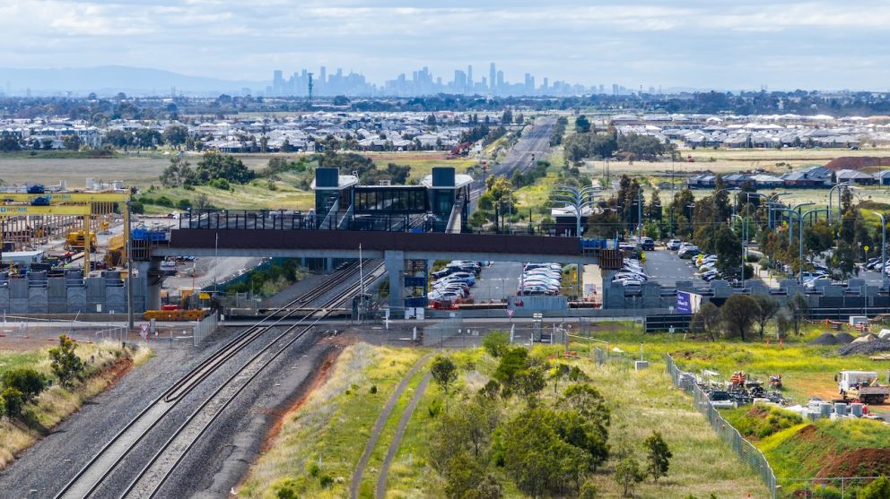 The new Ferris Road bridge under construction with the Melbourne skyline behind