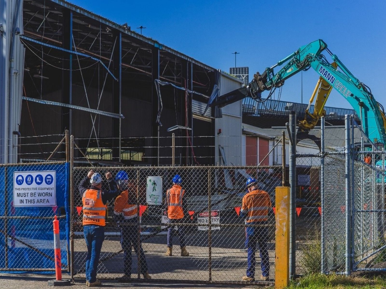 Photo of an old industrial building being demolished