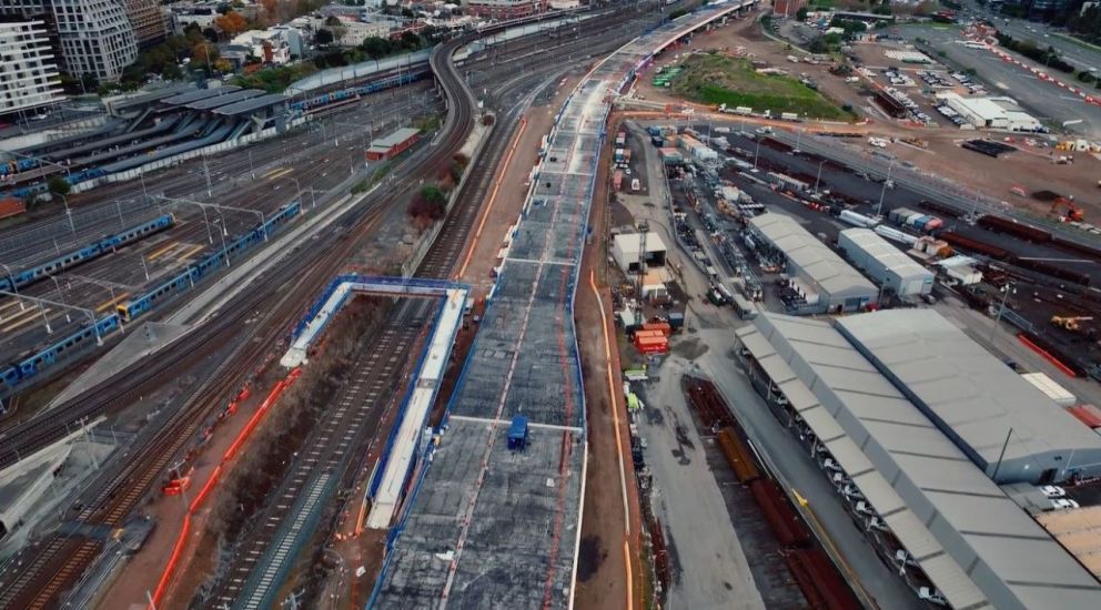 An aerial view of the Wurundjeri Way extension across Melbourne Rail Yards.