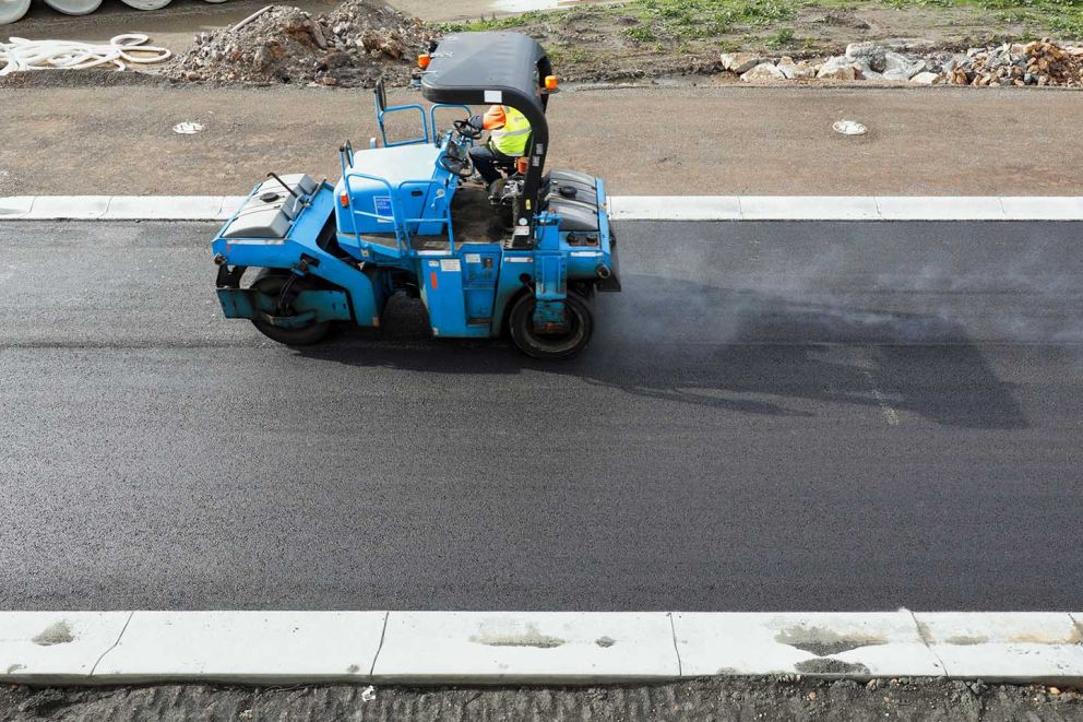 Asphalting works for the entry ramp at Lower Dandenong Road 