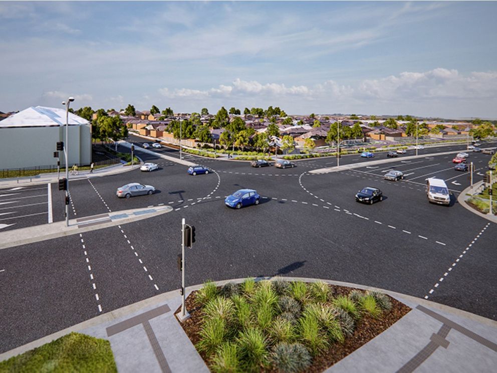 Artist impression of the added intersection at O’Shea Road and Skyline Way. Image shows the intersection with cars driving through the intersection and housing in the background