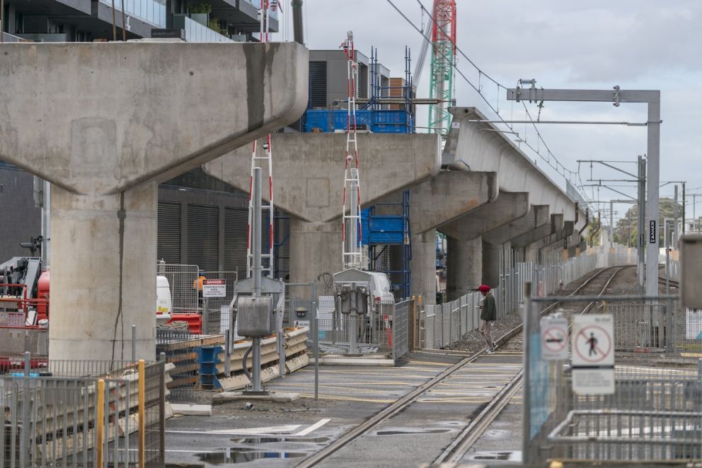 Pairs of L-beams were joined together by a concrete “stitch”, forming a U-shaped trough for the trains to run over