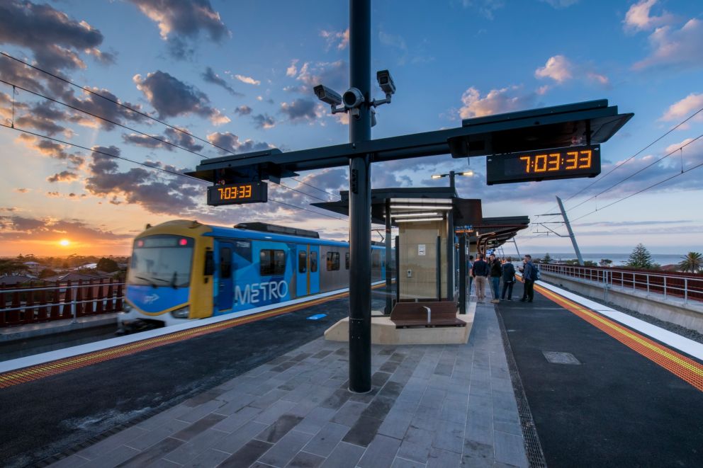 A train about to depart Carrum Station in the evening