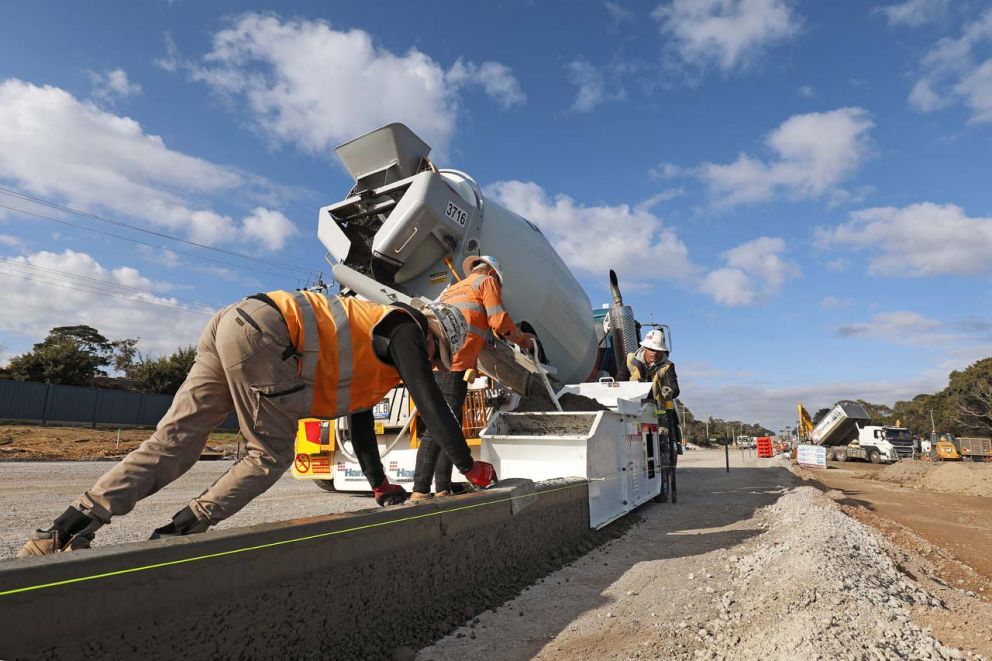 New kerbs being laid for the upgraded intersections on the Western Port Highway Upgrade