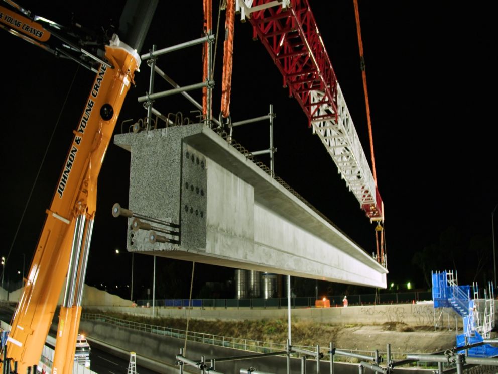 Lifting beams into place at Grieve Parade bridge over the West Gate Freeway