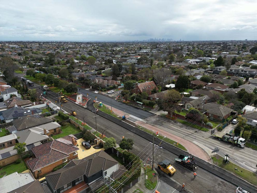 Aerial view of South Road at Tucker Road midway through asphalting works