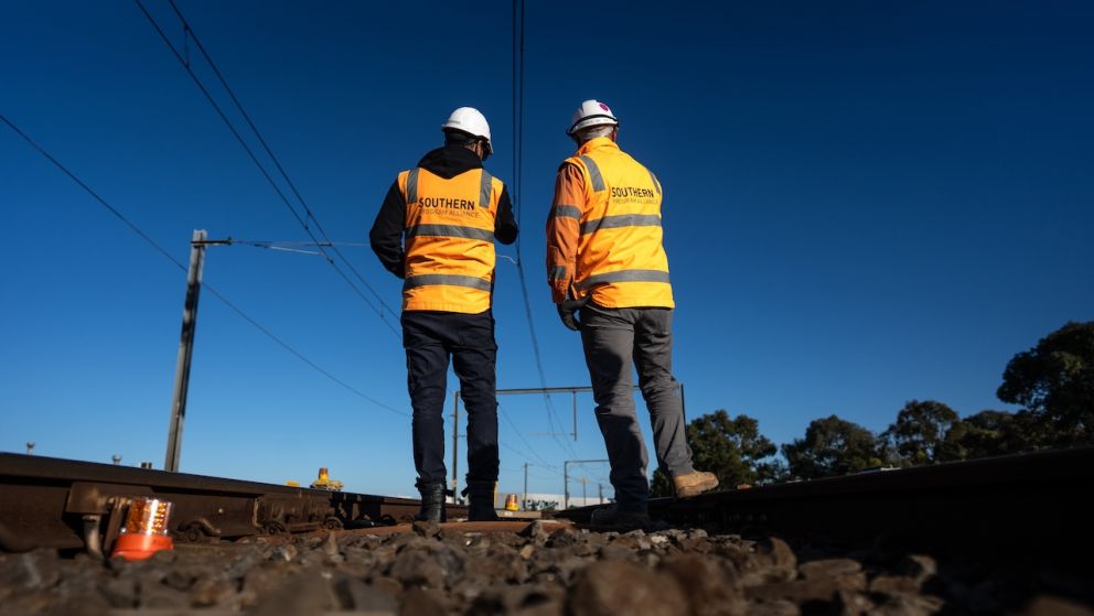 Workers inspect tracks on the Werribee Line during a construction blitz