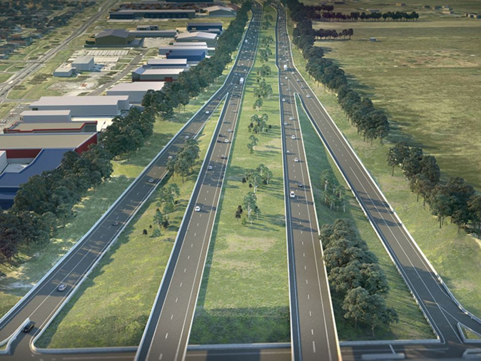 An artist impression of Thames Promenade froma birds eye view. The image highlights the green space between roads, either side of the road and the warehouses alongside the road