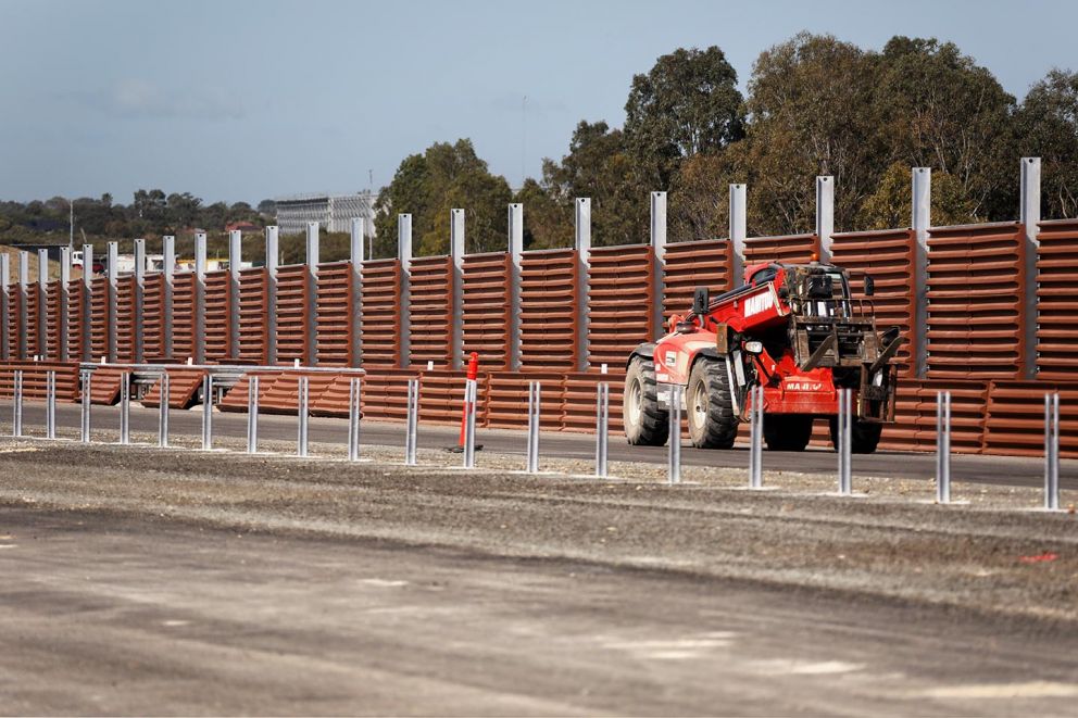 Continuing to install the 75% recycled plastic noise walls along the freeway 