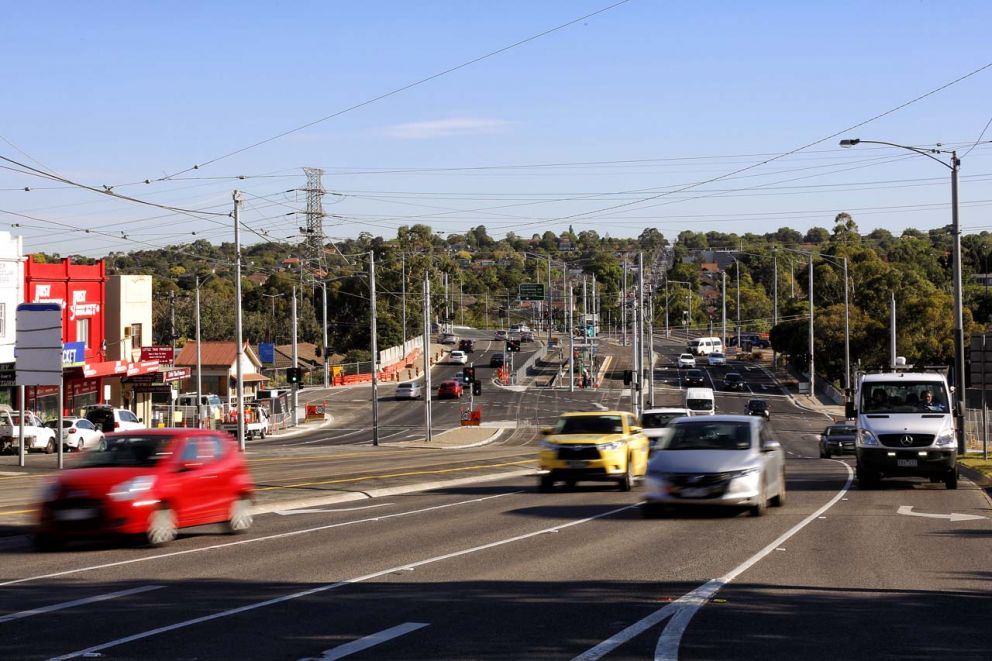 Cars travelling on the reopened level crossing-free Burke Road in January 2016