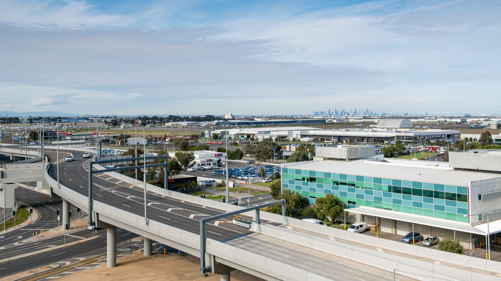 Birdseye view of Tullamarine airport with Melbourne CBD in the background