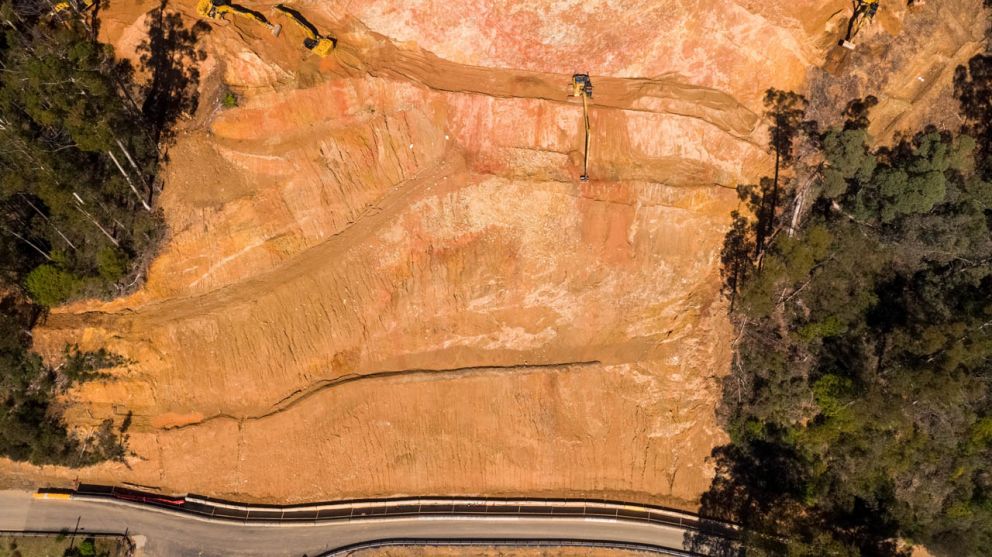 View from above, looking down onto the landslip at the benching process 14 April