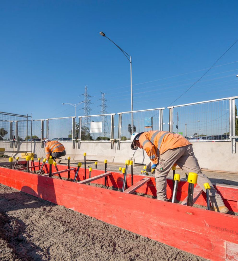 Workers Pouring concrete at the Frensham Reserve offset car park