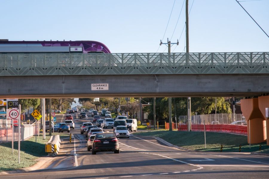 A train passes over the Exford Road rail bridge