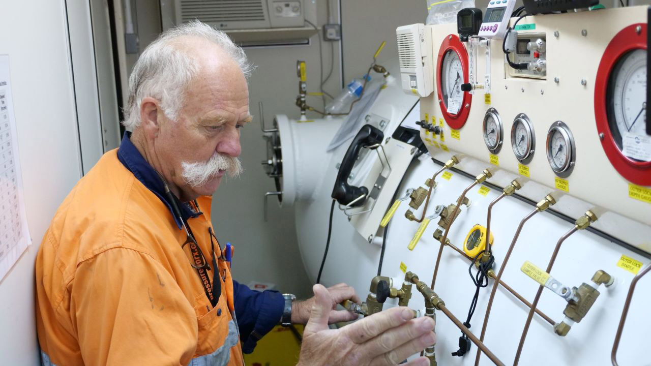 Man inside hyperbaric chamber