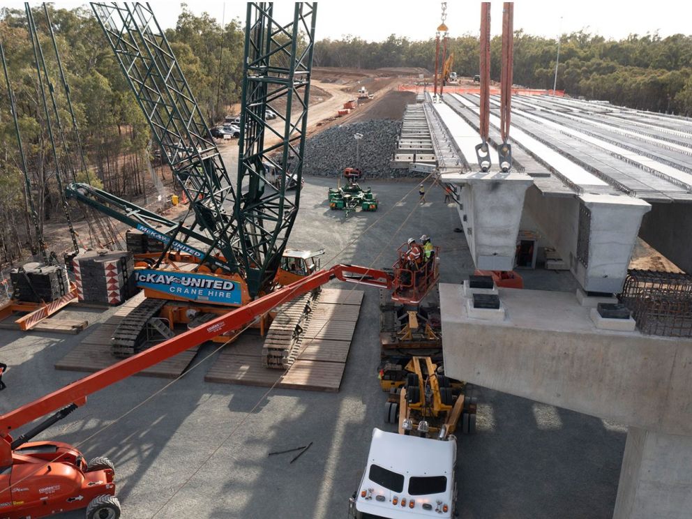 Bridge beam being installed