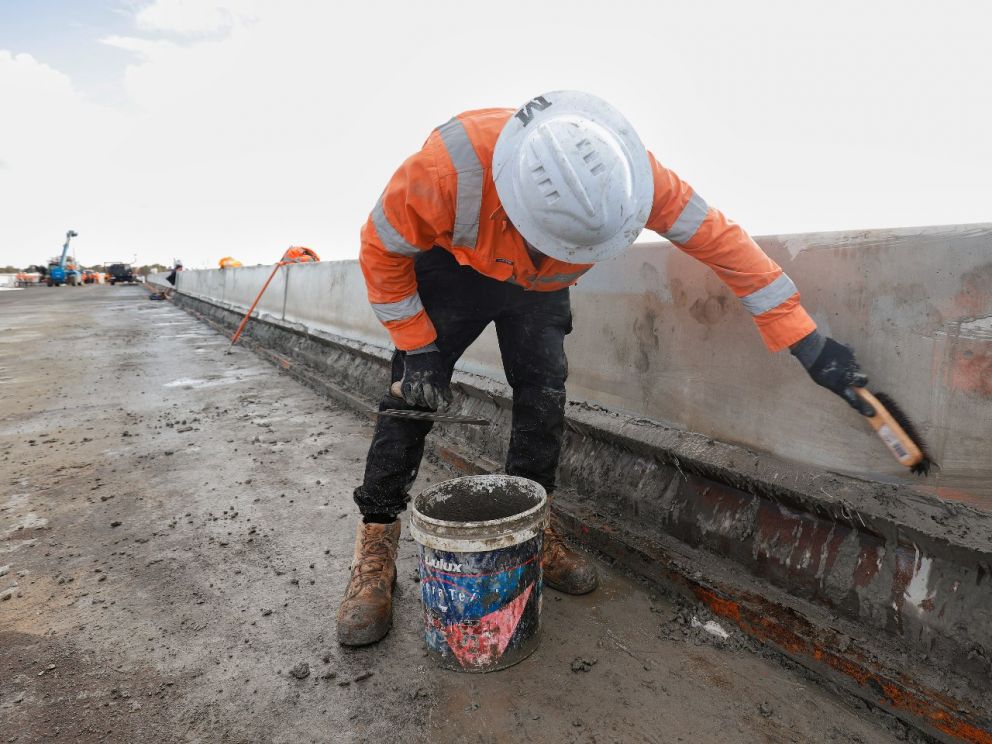 Works to build the safety barriers on the 400-metre twin bridges over the Waterways wetlands