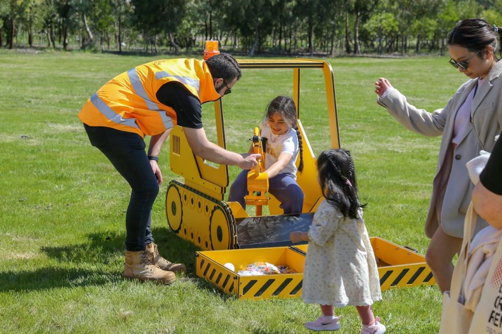 Kids learning how to use a digger