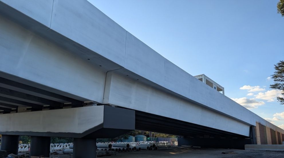 Old Calder Highway retaining wall and bridge piers painted